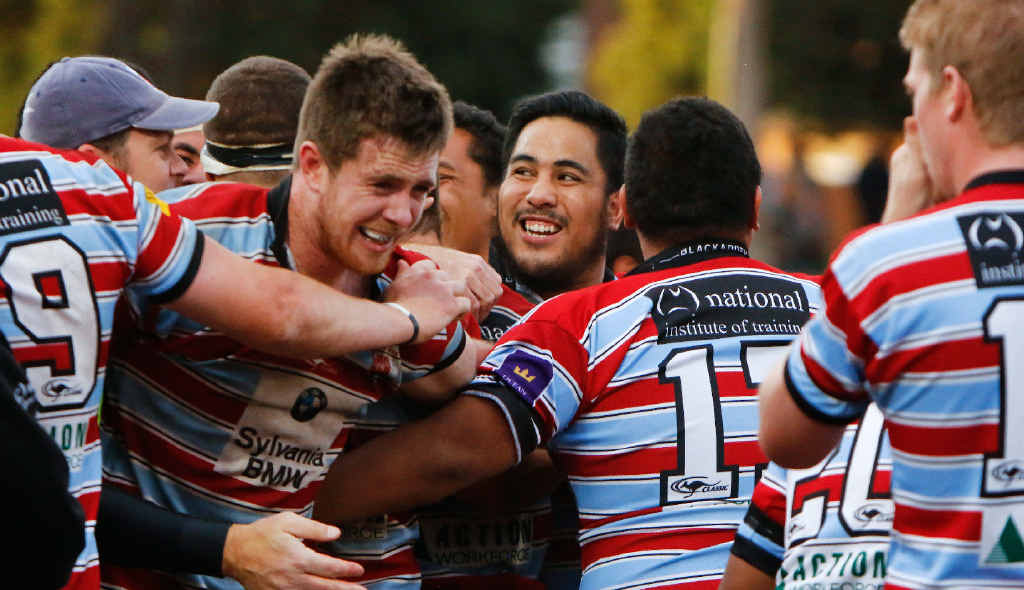 LEADING THE CHARGE: Jed Holloway is swamped by Southern Districts teammates after last week’s semi-final win over Sydney Uni. PHOTO: Karen Watson LEADING THE CHARGE: Jed Holloway is swamped by Southern Districts teammates after last week’s semi-final win over Sydney Uni. PHOTO: Karen Watson
